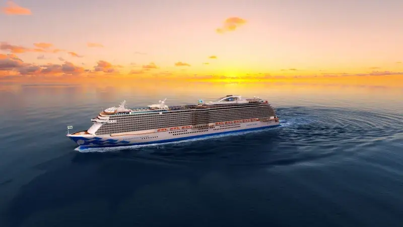 Enchanted Princess'in gün batımında açık denizde görselleştirmesi
